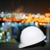safety hard hat and lights in background